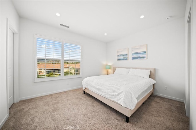 bedroom with carpet flooring, baseboards, and recessed lighting