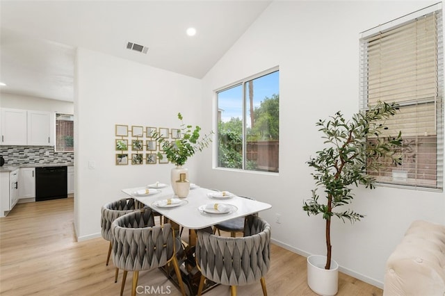 3116 Windhaven Way, Corona, CA 92882 - dining room with light wood-style floors, recessed lighting, baseboards, and lofted ceiling