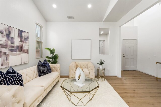 3116 Windhaven Way, Corona, CA 92882 - living room featuring wood finished floors, recessed lighting, baseboards, and lofted ceiling