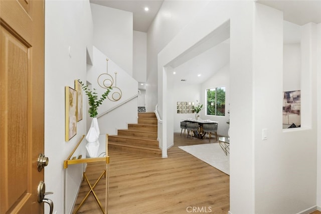 3116 Windhaven Way, Corona, CA 92882 - foyer with light wood-style floors, stairs, recessed lighting, and vaulted ceiling