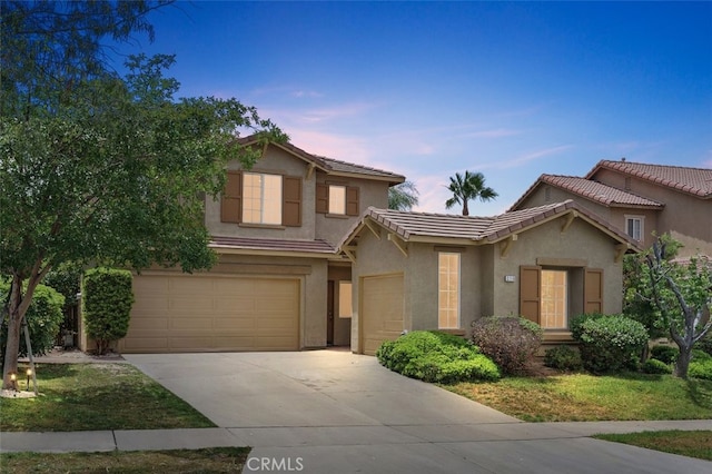 3116 Windhaven Way, Corona, CA 92882 - view of front of house featuring driveway, stucco siding, an attached garage, and a tiled roof