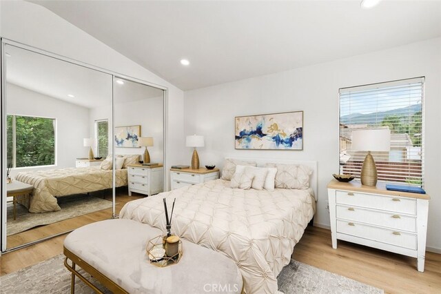 3116 Windhaven Way, Corona, CA 92882 - bedroom with vaulted ceiling, light wood-type flooring, a closet, and recessed lighting
