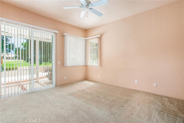 588 Twin Hills Dr, Banning, CA 92220 - empty room with carpet floors, ceiling fan, and baseboards