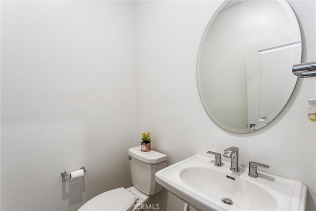 2335 Powell Dr, Rialto, CA 92377 - bathroom with a sink and toilet