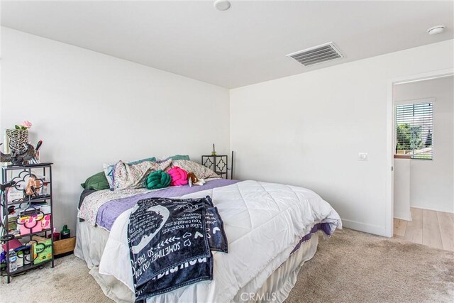 2335 Powell Dr, Rialto, CA 92377 - bedroom featuring carpet floors and baseboards