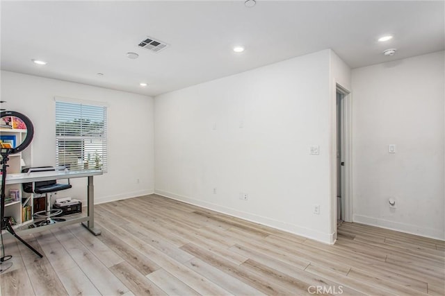 2335 Powell Dr, Rialto, CA 92377 - office with light wood-style floors, recessed lighting, and baseboards