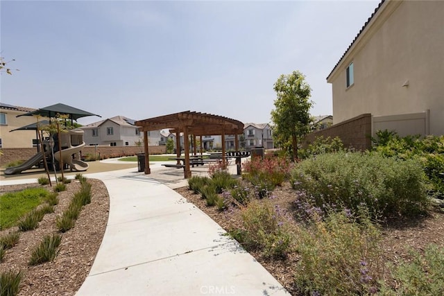 1810 Park Place Ln, Riverside, CA 92501 - view of community with a pergola, fence, and a residential view