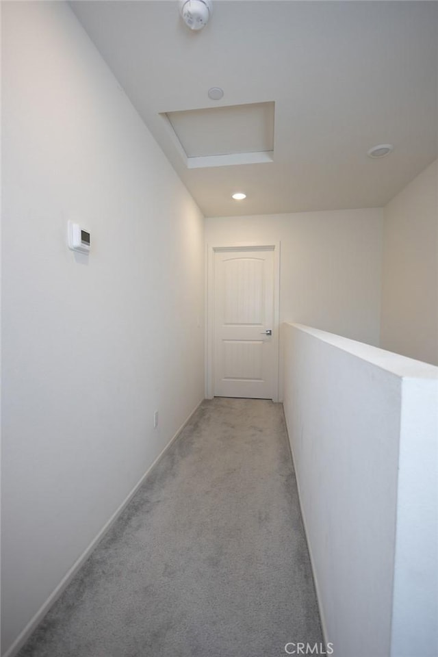 1810 Park Place Ln, Riverside, CA 92501 - hallway featuring attic access, light carpet, recessed lighting, baseboards, and an upstairs landing