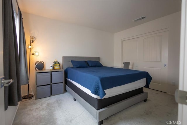 1810 Park Place Ln, Riverside, CA 92501 - bedroom with light colored carpet and a closet