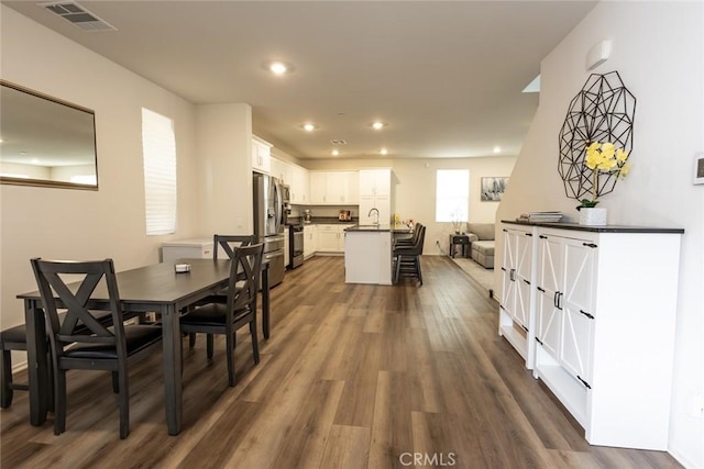 1810 Park Place Ln, Riverside, CA 92501 - dining area featuring dark wood-style floors and recessed lighting