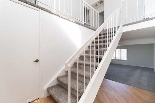 6523 E Camino Unit 2, Anaheim, CA 92807 - stairs with wood finished floors