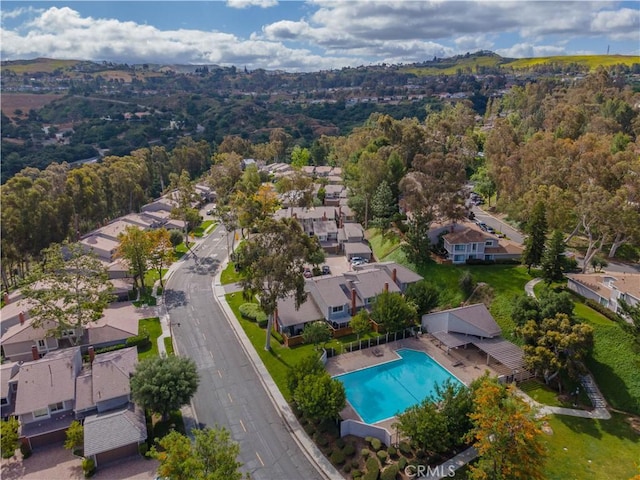 6523 E Camino Unit 2, Anaheim, CA 92807 - aerial overview of property's location with nearby suburban area and a pool area