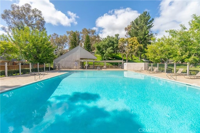 6523 E Camino Unit 2, Anaheim, CA 92807 - community pool with fence and a patio