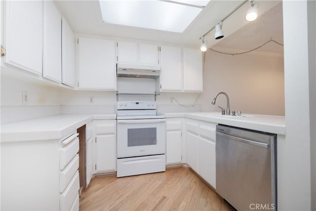 6523 E Camino Unit 2, Anaheim, CA 92807 - kitchen with white electric range, stainless steel dishwasher, under cabinet range hood, a sink, and light wood-type flooring