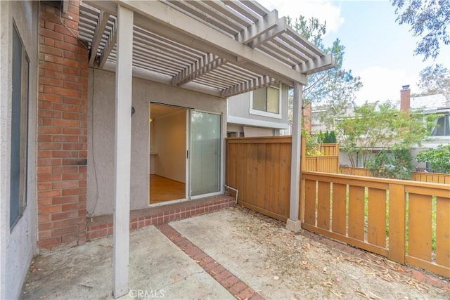 6523 E Camino Unit 2, Anaheim, CA 92807 - view of patio with fence and a pergola