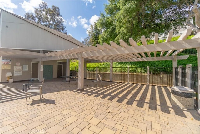 6523 E Camino Unit 2, Anaheim, CA 92807 - view of patio with fence and a pergola