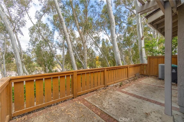 6523 E Camino Unit 2, Anaheim, CA 92807 - view of patio / terrace with a fenced backyard and central AC