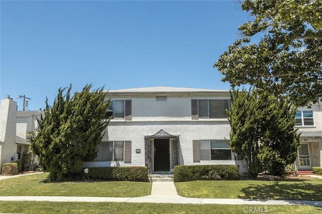 267 La Verne Ave, Long Beach, CA 90803 - view of front facade with stucco siding and a front lawn