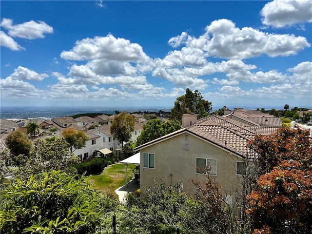 18560 Stonegate Ln, Rowland Heights, CA 91748 - view of property exterior with stucco siding, a residential view, and a tiled roof