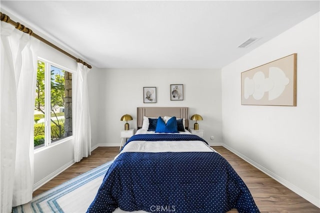 18560 Stonegate Ln, Rowland Heights, CA 91748 - bedroom featuring wood finished floors and baseboards