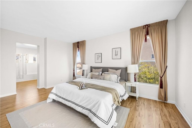 18560 Stonegate Ln, Rowland Heights, CA 91748 - bedroom featuring light wood-style flooring and baseboards