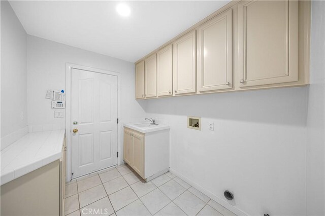 18560 Stonegate Ln, Rowland Heights, CA 91748 - clothes washing area with cabinet space, hookup for a washing machine, baseboards, and light tile patterned floors