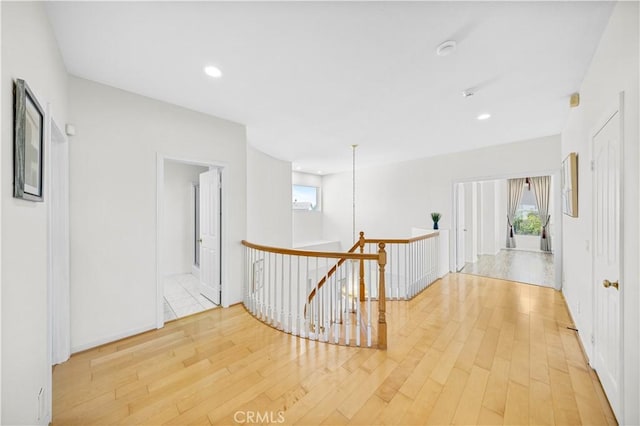 18560 Stonegate Ln, Rowland Heights, CA 91748 - corridor featuring an upstairs landing, light wood-style floors, plenty of natural light, and recessed lighting