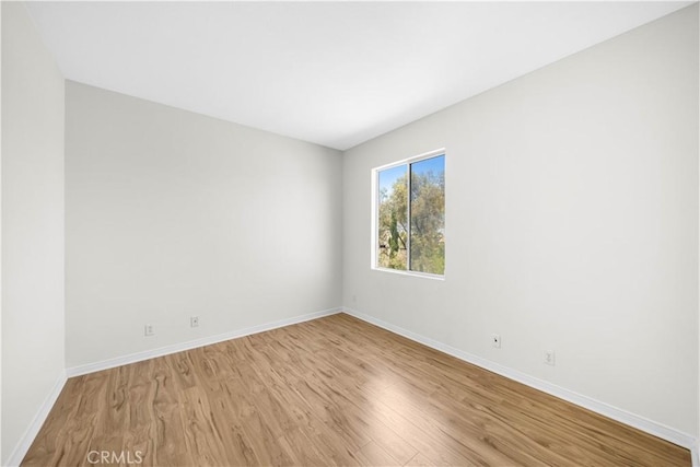 18560 Stonegate Ln, Rowland Heights, CA 91748 - unfurnished room with light wood-style floors and baseboards