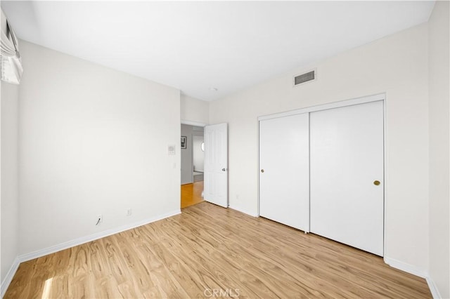 18560 Stonegate Ln, Rowland Heights, CA 91748 - unfurnished bedroom featuring light wood-style flooring, baseboards, and a closet