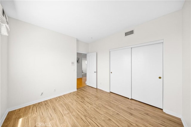 18560 Stonegate Ln, Rowland Heights, CA 91748 - unfurnished bedroom featuring light wood-style flooring and a closet
