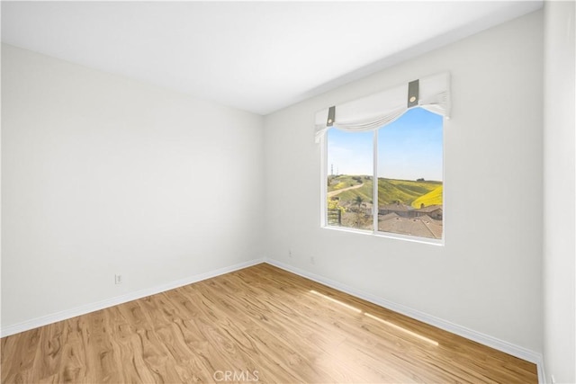 18560 Stonegate Ln, Rowland Heights, CA 91748 - spare room with baseboards and light wood-style floors