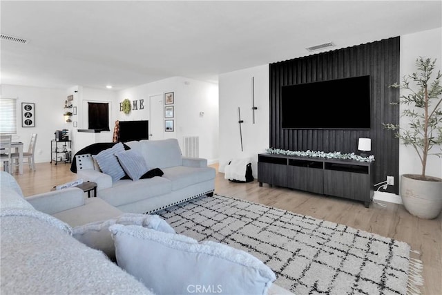21046 Lone Eagle Rd, Apple Valley, CA 92308 - living room featuring baseboards, wood finished floors, and recessed lighting