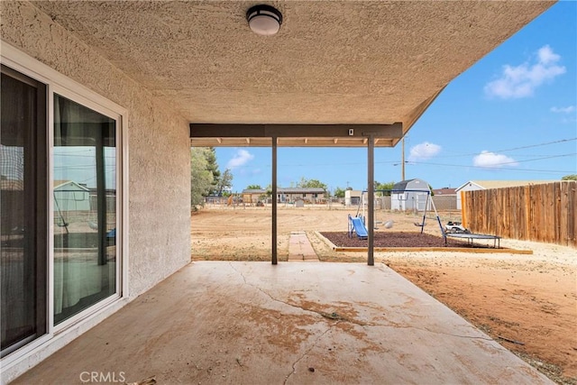 21046 Lone Eagle Rd, Apple Valley, CA 92308 - view of patio / terrace featuring fence