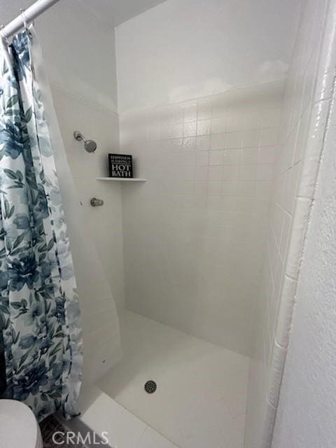 8960 Indiana Ave, Riverside, CA 92503 - bathroom with a stall shower and toilet