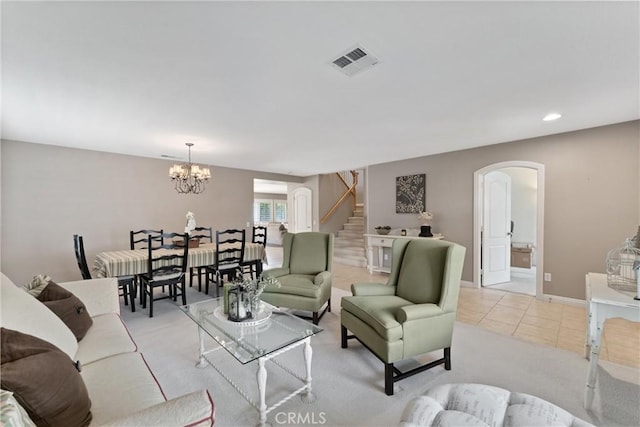 5549 Pine Ave, Chino Hills, CA 91709 - living area with arched walkways, stairway, a chandelier, light tile patterned floors, and recessed lighting