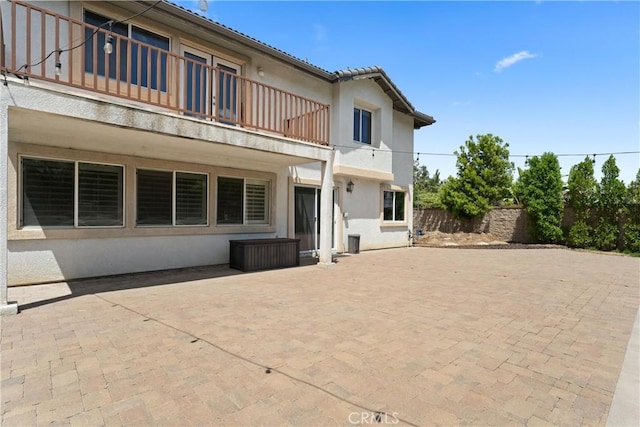 5549 Pine Ave, Chino Hills, CA 91709 - back of house with a balcony, stucco siding, and a patio area