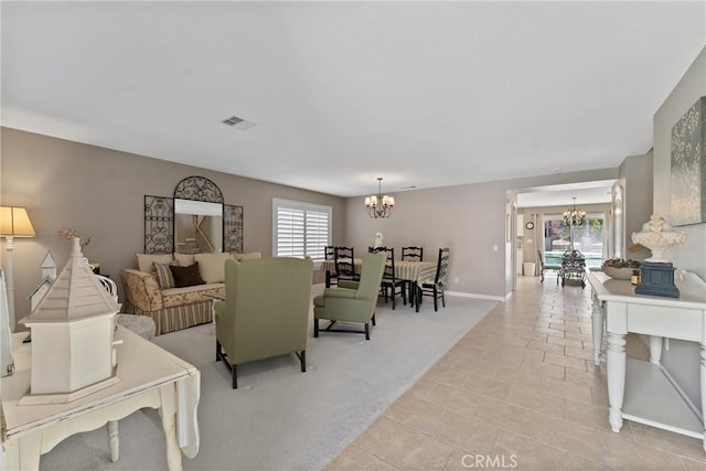 5549 Pine Ave, Chino Hills, CA 91709 - living area with a chandelier, healthy amount of natural light, light tile patterned floors, and light carpet