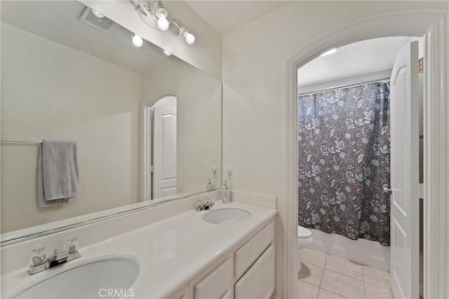 5549 Pine Ave, Chino Hills, CA 91709 - bathroom featuring toilet, tile patterned floors, double vanity, and shower / bath combo with shower curtain