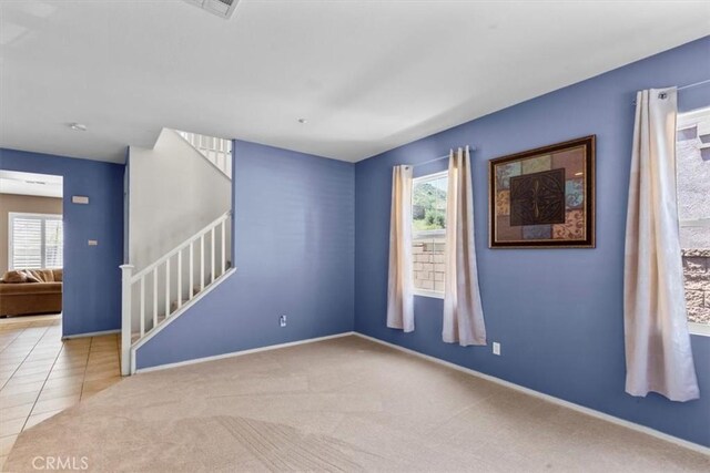 16549 Gala Ave, Fontana, CA 92337 - empty room featuring stairs, baseboards, and carpet flooring