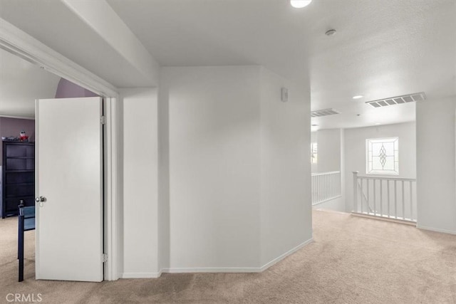 16549 Gala Ave, Fontana, CA 92337 - hall with carpet flooring, an upstairs landing, and baseboards