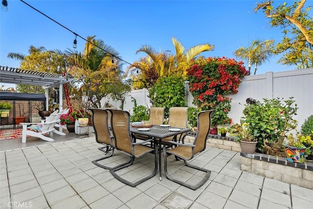 21372 Sand Dollar Ln, Huntington Beach, CA 92646 - view of patio / terrace featuring a pergola, outdoor dining area, and a fenced backyard