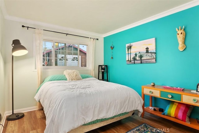 21372 Sand Dollar Ln, Huntington Beach, CA 92646 - bedroom featuring baseboards, crown molding, and wood finished floors