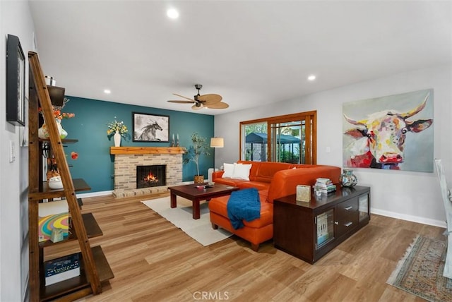 21372 Sand Dollar Ln, Huntington Beach, CA 92646 - living room with ceiling fan, wood finished floors, recessed lighting, a brick fireplace, and baseboards