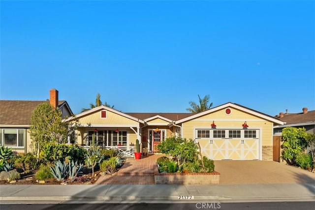 21372 Sand Dollar Ln, Huntington Beach, CA 92646 - single story home featuring an attached garage and concrete driveway