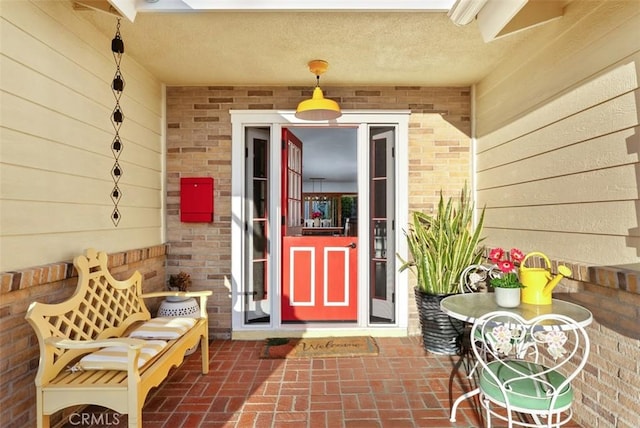 21372 Sand Dollar Ln, Huntington Beach, CA 92646 - doorway to property featuring brick siding