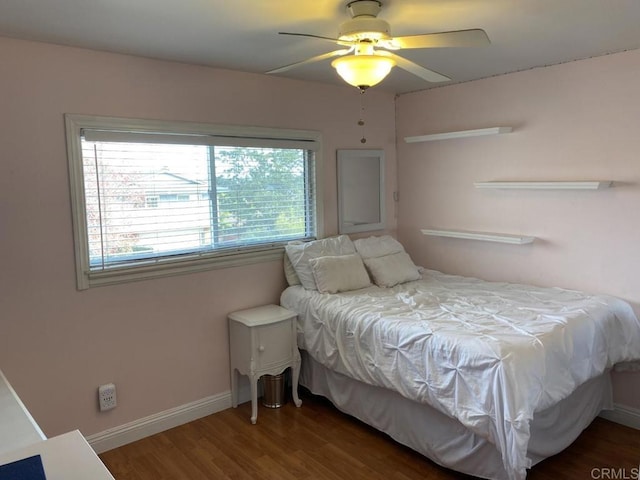 6172 Tamilynn St, San Diego, CA 92122 - bedroom with wood finished floors, baseboards, and ceiling fan