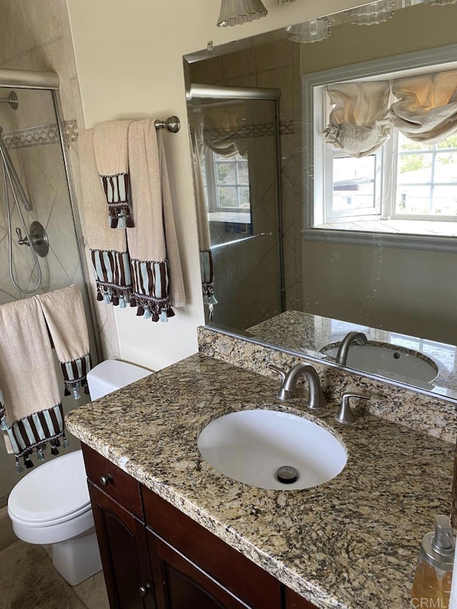 6172 Tamilynn St, San Diego, CA 92122 - bathroom with healthy amount of natural light, a shower stall, and vanity