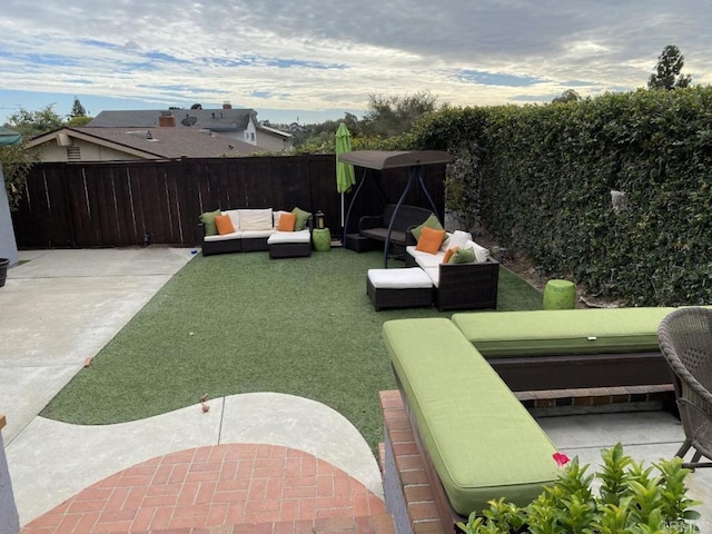 6172 Tamilynn St, San Diego, CA 92122 - fenced backyard featuring a patio and an outdoor hangout area