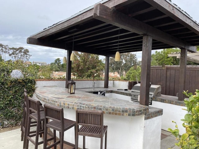 6172 Tamilynn St, San Diego, CA 92122 - view of patio / terrace featuring exterior kitchen, grilling area, and fence