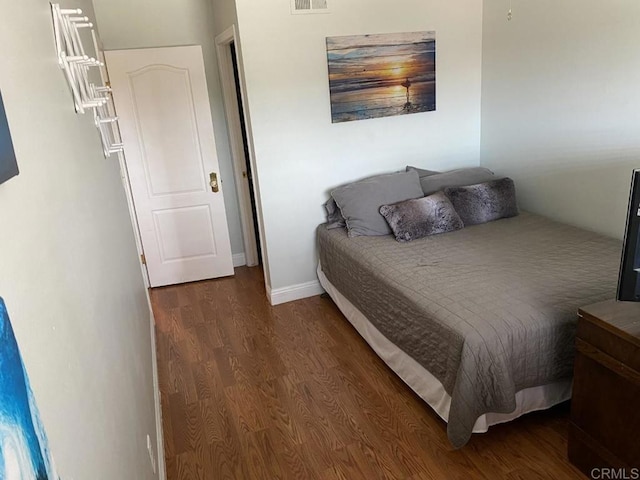6172 Tamilynn St, San Diego, CA 92122 - bedroom with wood finished floors and baseboards